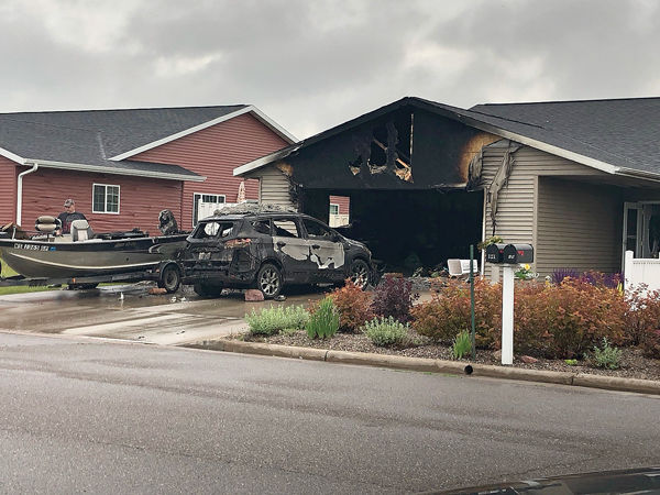 Fire Sunday Destroys Garage, Car, Boat